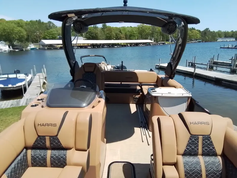 Slide: The Image of Luxurious Harris 230 Grand Marin boat by the lake, 2023 model. - 12