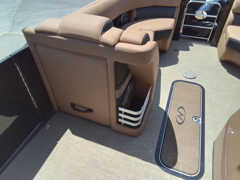 Slide: The Image of Interior of a 2023 Harris 230 GRAND MARIN boat with beige upholstery. - 16