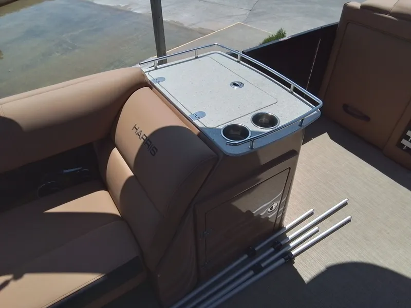 Slide: The Image of Interior of 2023 Harris 230 GRAND MARIN with seating and table. - 17