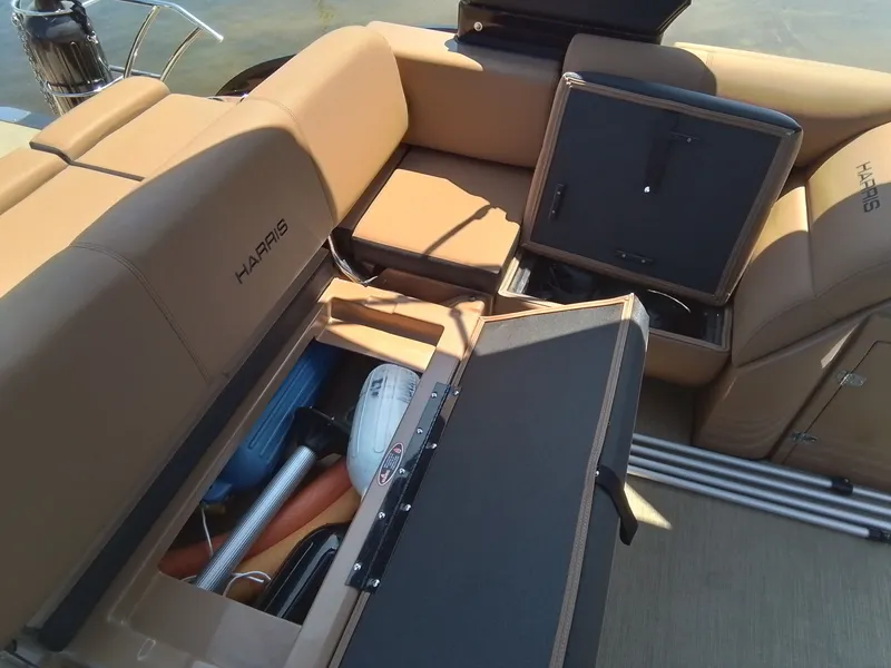 Slide: The Image of Interior of 2023 Harris 230 GRAND MARIN with storage compartments. - 26