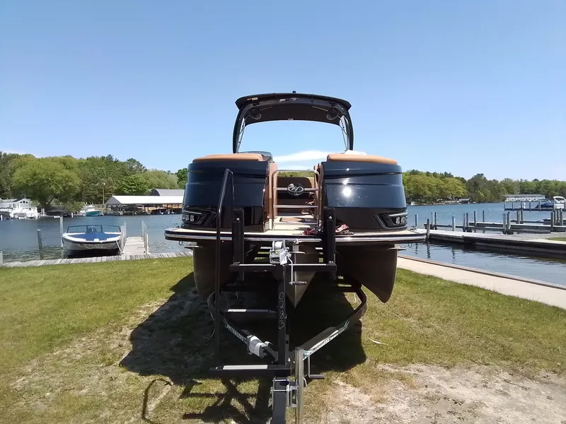 Slide: The Image of 2023 Harris 230 GRAND MARIN pontoon boat by the lakeside. - 5