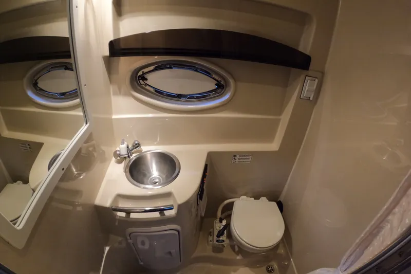 Slide: The Image of Interior of 2006 Four Winns 278 Vista yacht with sink and toilet. - 16