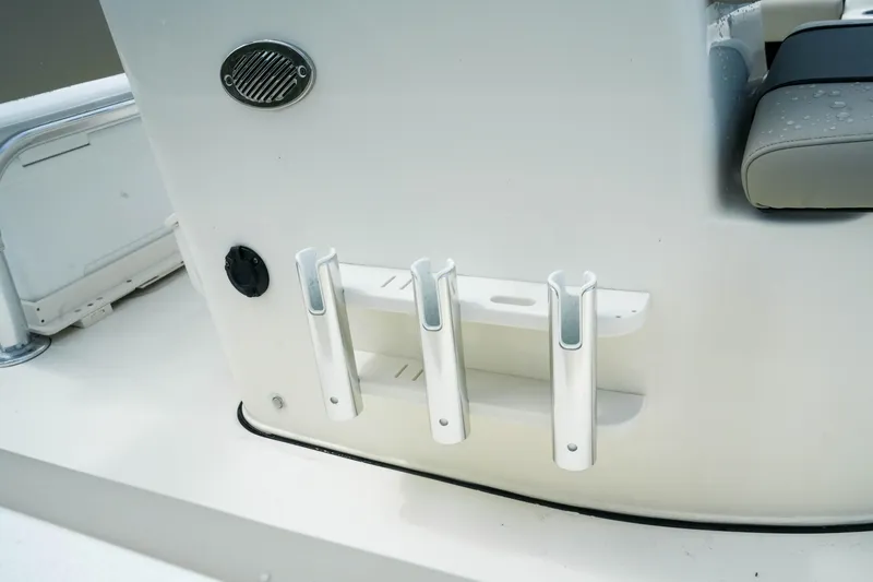 Slide: The Image of Rod holders on a 2025 Key West 210 Bay Reef boat deck. - 14