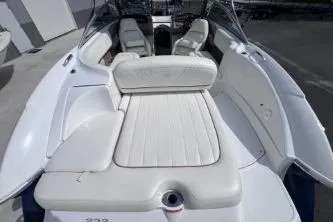 Slide: The Image of 2007 Cobalt 232 boat with white leather seating and spacious interior. - 11