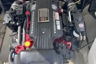 Slide: The Image of Volvo Penta engine in a 2007 Cobalt 232 boat, detailed view. - 20