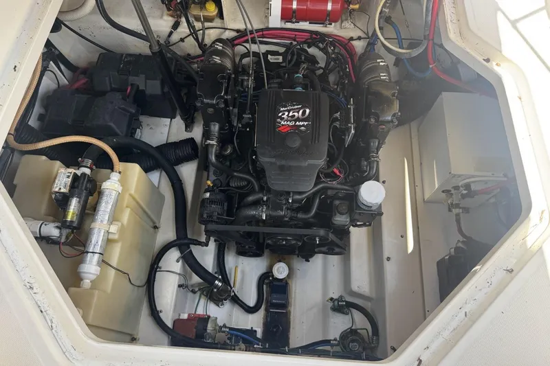 Slide: The Image of Engine compartment of a 2008 Sea Ray Sundancer 260 boat, featuring a MerCruiser 350 MAG engine. - 47