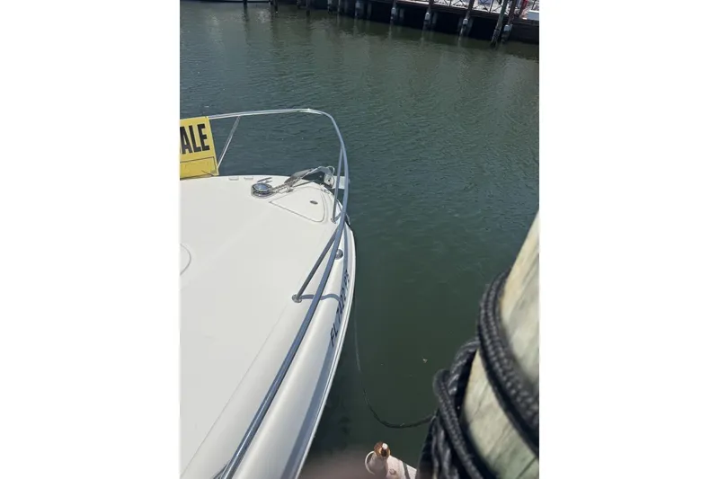 Slide: The Image of 2008 Sea Ray Sundancer 260 boat docked, with "For Sale" sign visible. - 48