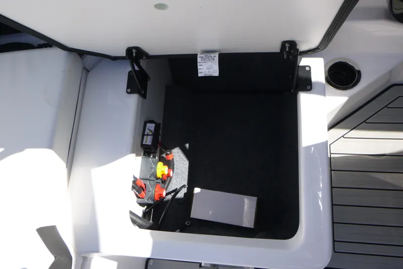Slide: The Image of Storage compartment of 2026 Yamaha Boats 222SD, featuring organized interior and modern design. - 15