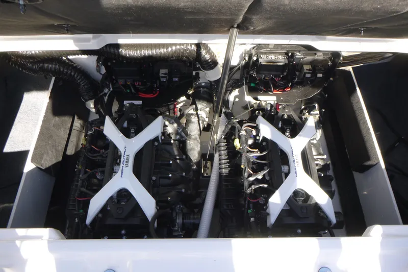 Slide: The Image of 2026 Yamaha Boats 222SD engine compartment with dual engines and wiring. - 17
