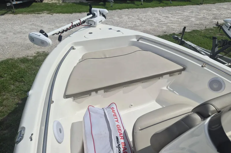 Slide: The Image of 2022 Key West 189 FS boat interior with safety gear bag and trolling motor. - 11