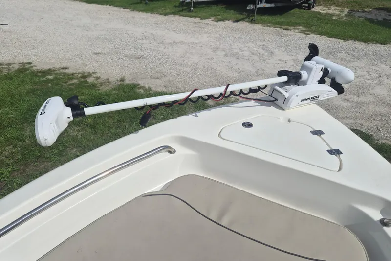 Slide: The Image of 2022 Key West 189 FS boat with Minn Kota trolling motor on deck. - 13