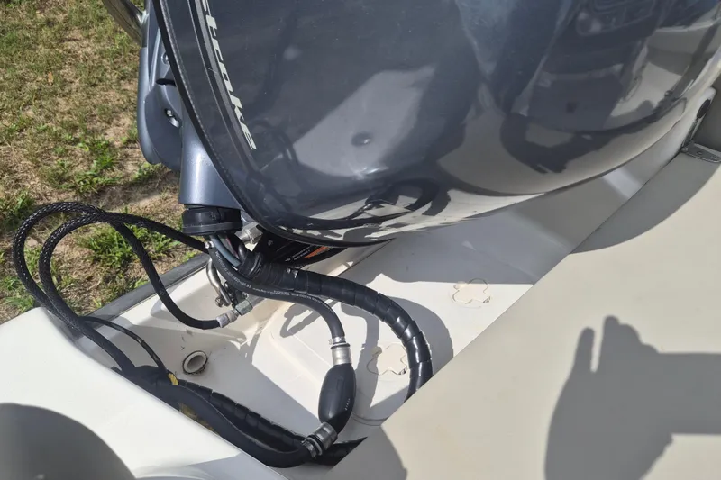Slide: The Image of 2022 Key West 189 FS boat engine and cables close-up. - 18