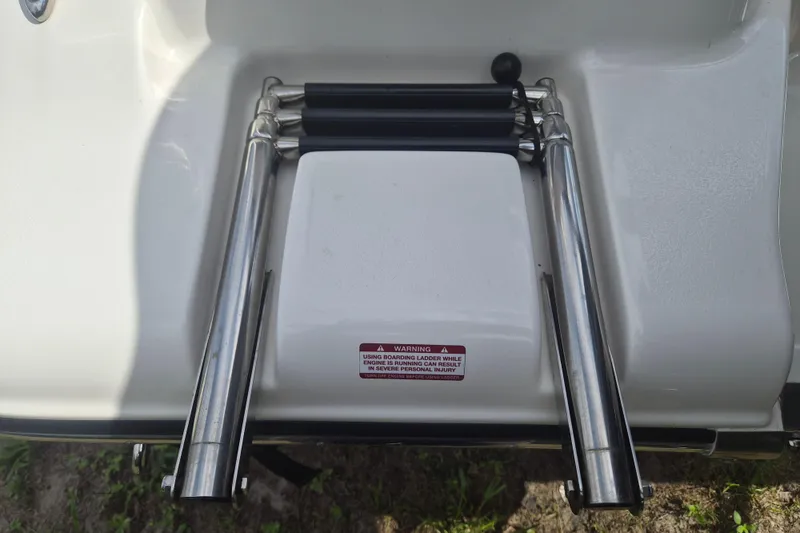 Slide: The Image of Stainless steel boat ladder on 2022 Key West 189 FS, folded and mounted. - 4