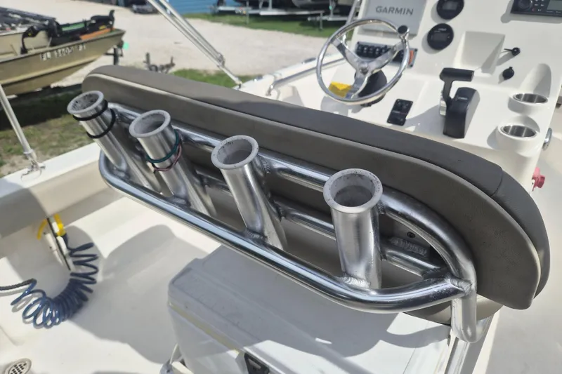 Slide: The Image of 2022 Key West 189 FS boat interior with rod holders and steering console. - 7