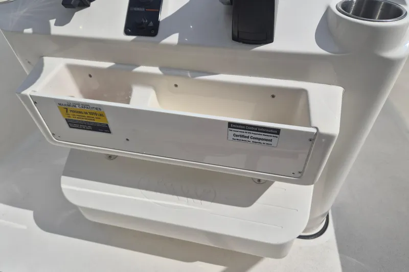 Slide: The Image of 2022 Key West 189 FS boat console with capacity and emission control labels. - 9