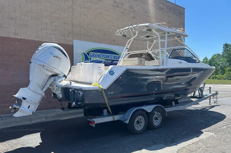 The Image of 2026 Solara S-250 DC boat on trailer at Grand Pointe Marina. - 0