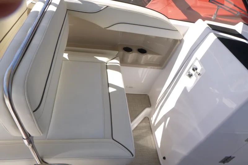 Slide: The Image of Interior seating of 2026 Solara S-250 DC boat with cup holders and sleek design. - 18