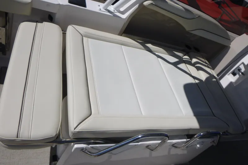 Slide: The Image of Luxurious seating on 2026 Solara S-250 DC boat, featuring sleek white upholstery. - 21