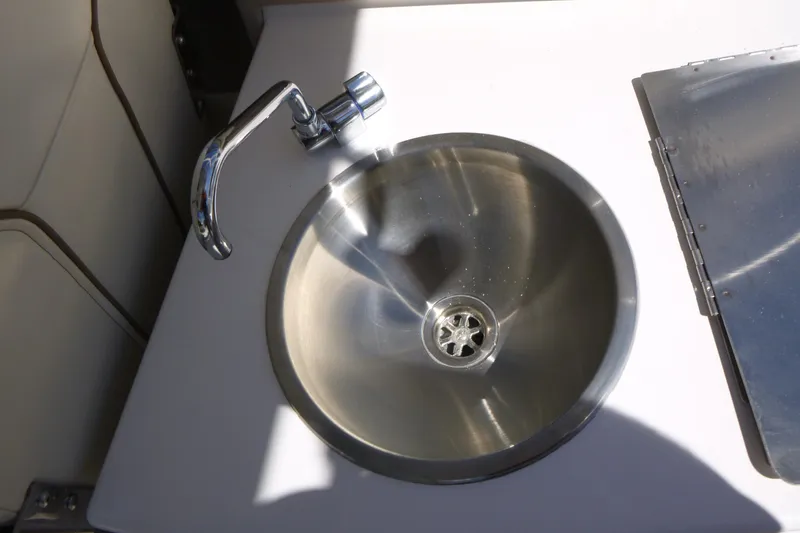 Slide: The Image of Stainless steel sink with faucet in 2026 Solara S-250 DC boat. - 23