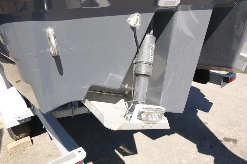 Slide: The Image of Rear view of 2026 Solara S-250 DC boat with Lenco trim tab. - 38
