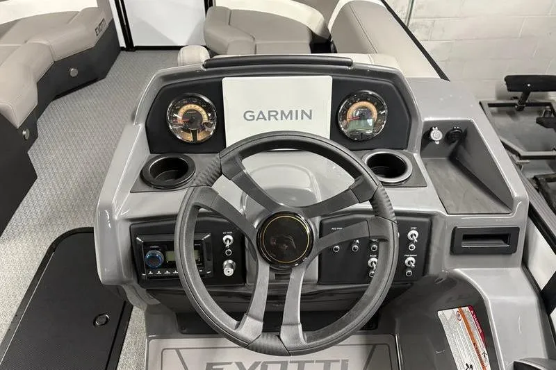 Slide: The Image of Steering console of 2026 Evotti 523QL boat with Garmin navigation system. - 4