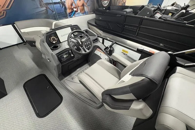 Slide: The Image of Interior of a 2026 Evotti 523QL boat with modern steering console. - 8