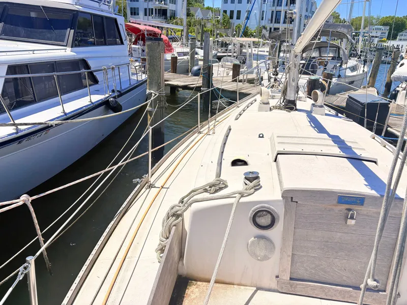 Slide: The Image of 1972 Tartan 34 Classic sailboat docked in marina. - 11