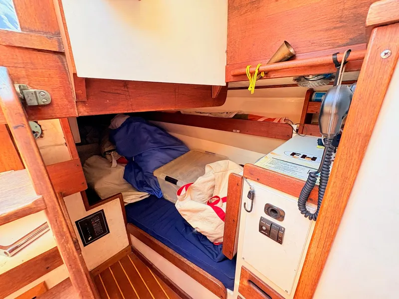 Slide: The Image of Interior of a 1972 Tartan 34 Classic yacht with wooden finish. - 19