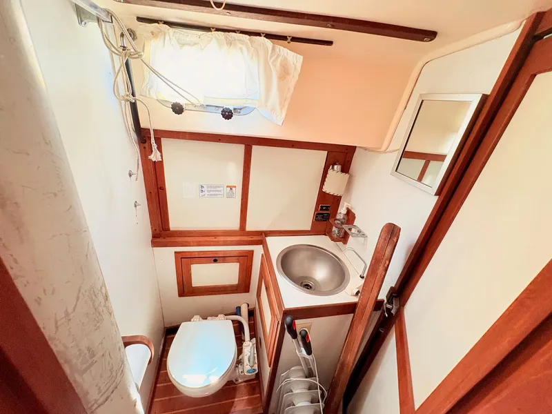 Slide: The Image of Interior view of a 1972 Tartan 34 Classic yacht bathroom. - 25