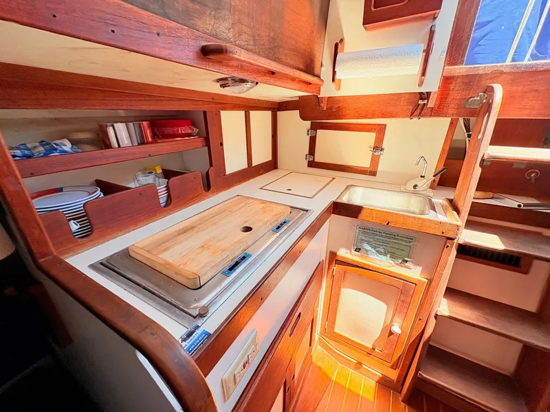 Slide: The Image of Interior view of a 1972 Tartan 34 Classic yacht kitchen. - 31