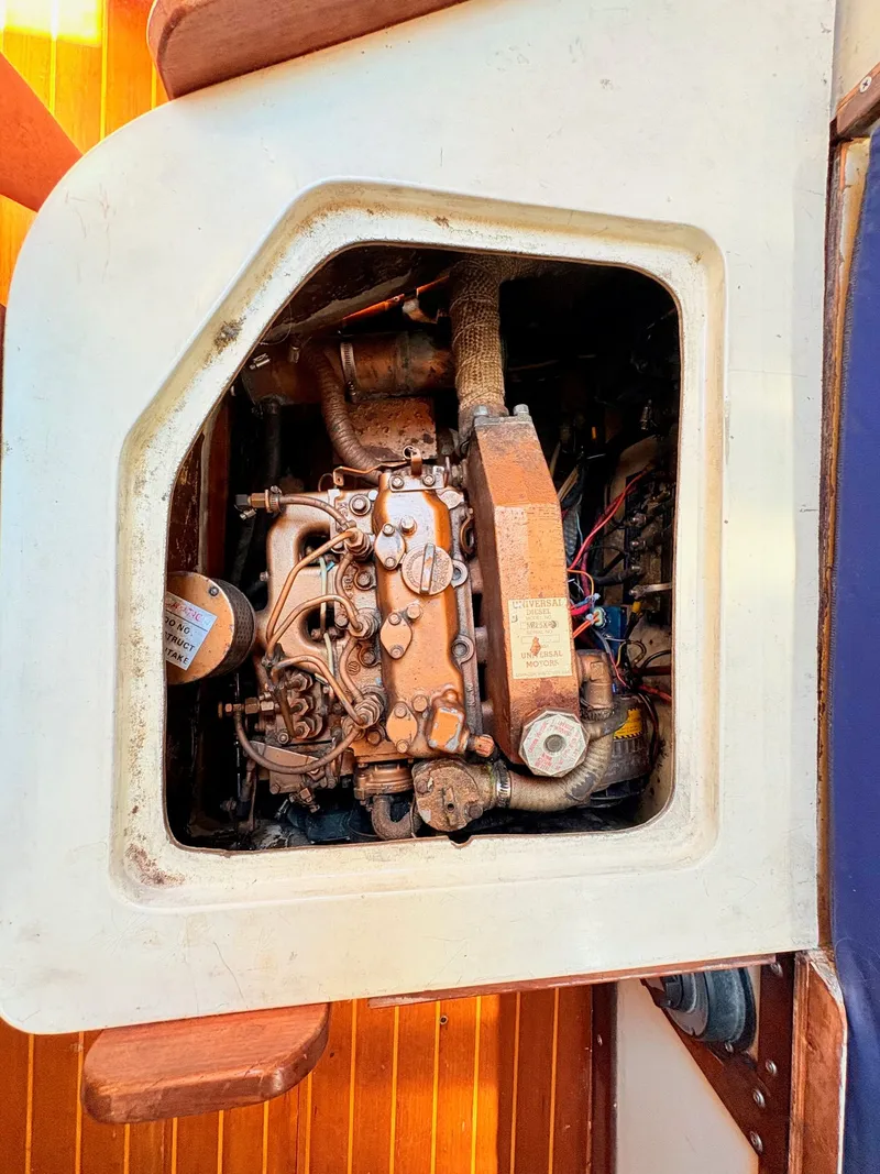 Slide: The Image of Engine compartment of a 1972 Tartan 34 Classic sailboat. - 35