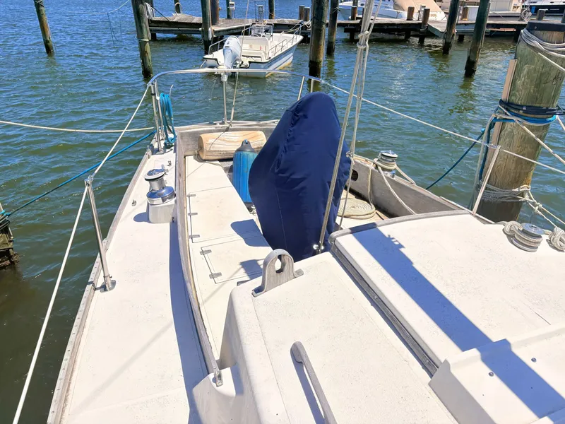 Slide: The Image of 1972 Tartan 34 Classic sailboat docked at marina. - 7