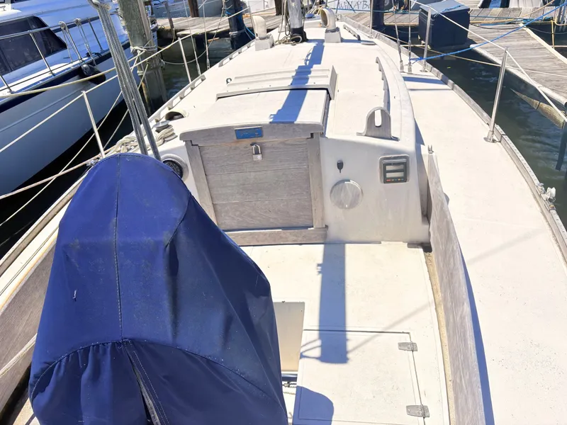 Slide: The Image of 1972 Tartan 34 Classic sailboat docked at marina. - 9