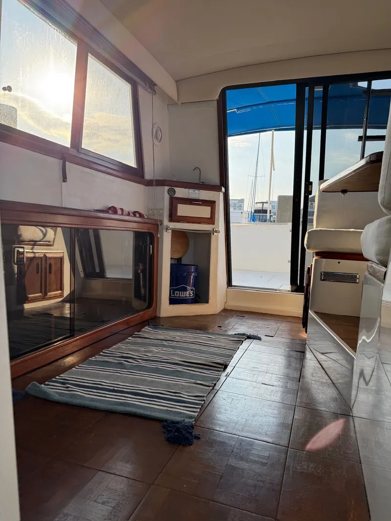 Slide: The Image of Interior of a 1989 Carver 320 Voyager yacht at sunset. - 10