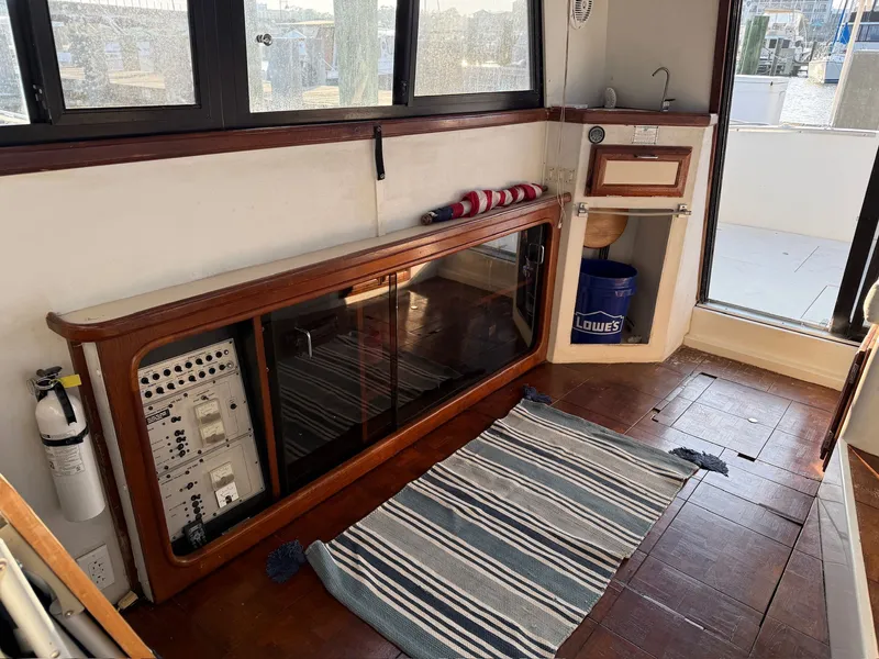 Slide: The Image of Interior of 1989 Carver 320 Voyager with control panel and rug. - 14