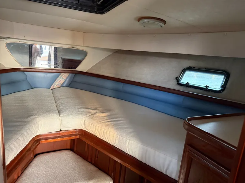 Slide: The Image of Interior of 1989 Carver 320 Voyager with cozy sleeping area. - 2
