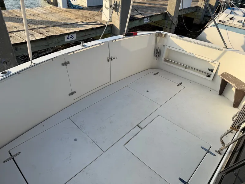 Slide: The Image of 1989 Carver 320 Voyager boat dock with spacious deck. - 4
