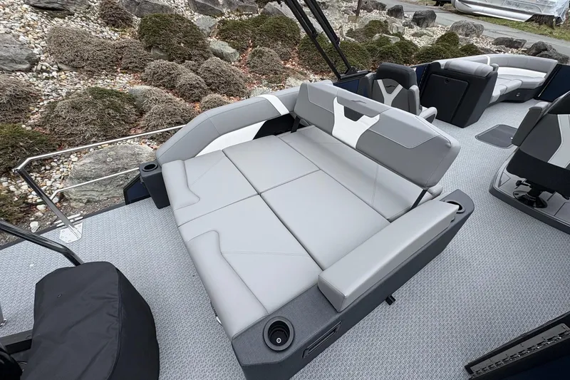Slide: The Image of Luxurious seating on 2026 Evotti 525CS boat, featuring sleek gray upholstery and modern design. - 11