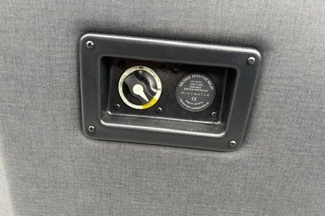 Slide: The Image of Control panel on Evotti 525CS 2026, featuring a gauge and label on gray fabric. - 15