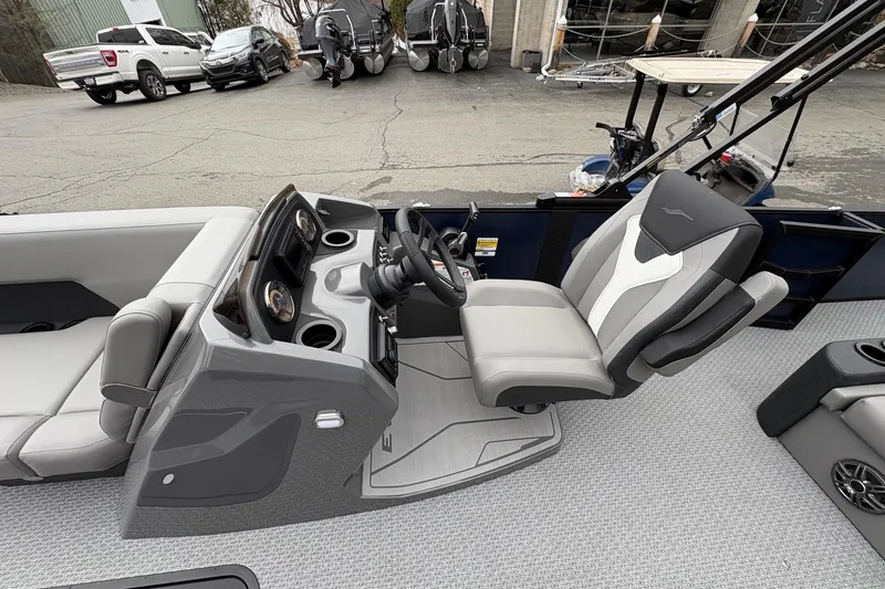 Slide: The Image of 2026 Evotti 525CS boat interior with modern helm and comfortable seating. - 2
