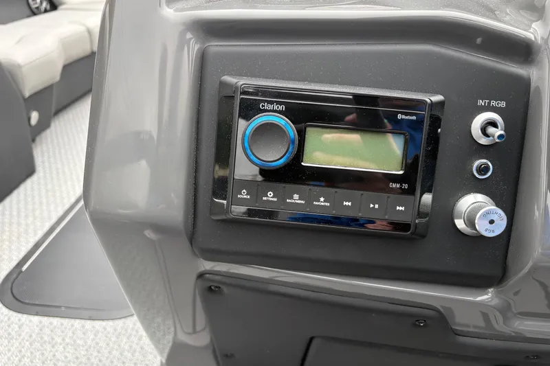 Slide: The Image of Control panel of 2026 Evotti 525CS with Clarion audio system and RGB lighting controls. - 5
