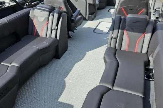 Slide: The Image of Luxurious interior of 2026 Evotti 723QL boat with sleek black seating and red accents. - 3