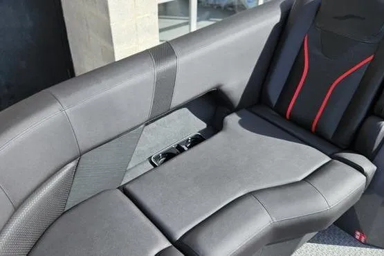 Slide: The Image of Luxurious interior seating of 2026 Evotti 723QL with sleek black and red design. - 7