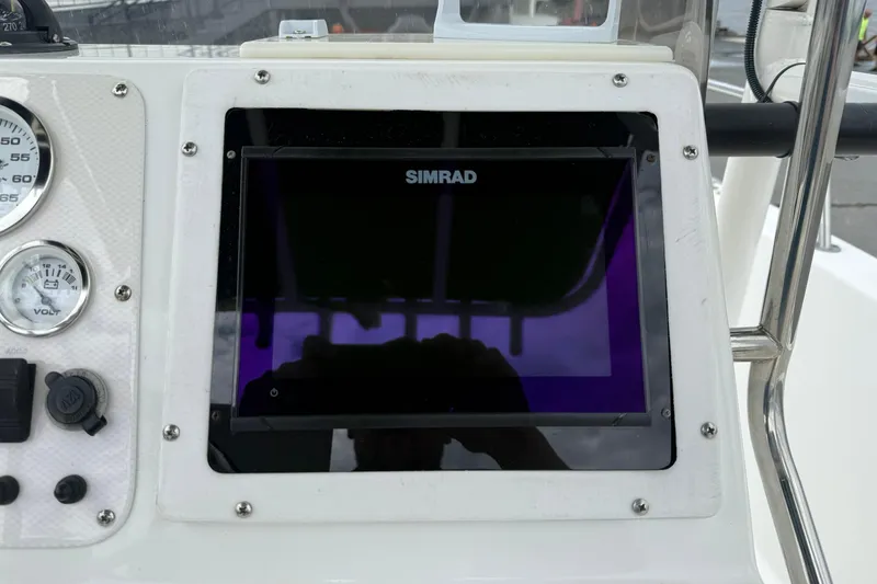 Slide: The Image of Console of 2005 Sea Pro 190 Center Console with Simrad display and gauges. - 10