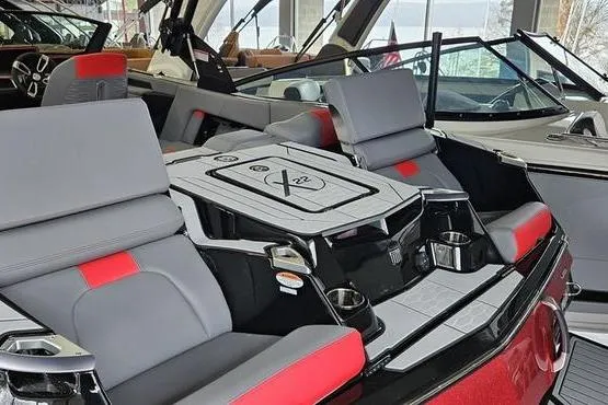 Slide: The Image of 2025 MasterCraft X22 boat interior with sleek seating and modern design. - 10