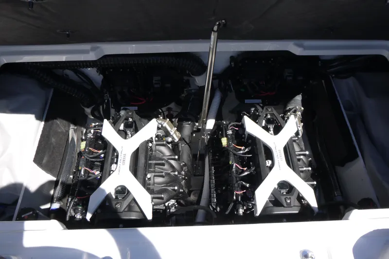 Slide: The Image of 2026 Yamaha Boats 222XD engine compartment with dual engines and mechanical components. - 17