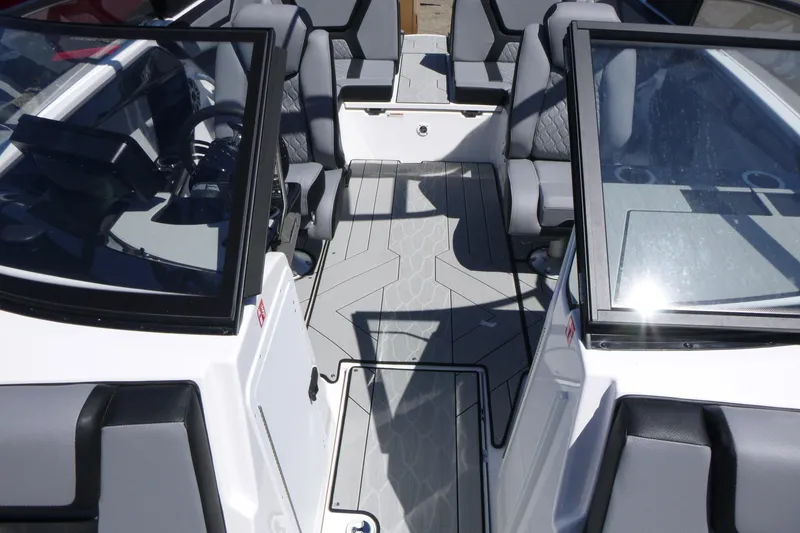Slide: The Image of 2026 Yamaha Boats 222XD interior with sleek seating and modern design. - 5