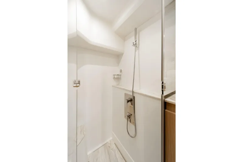 Slide: The Image of Modern shower area in Prestige F4.9 yacht, 2025 model, featuring sleek design and fixtures. - 33