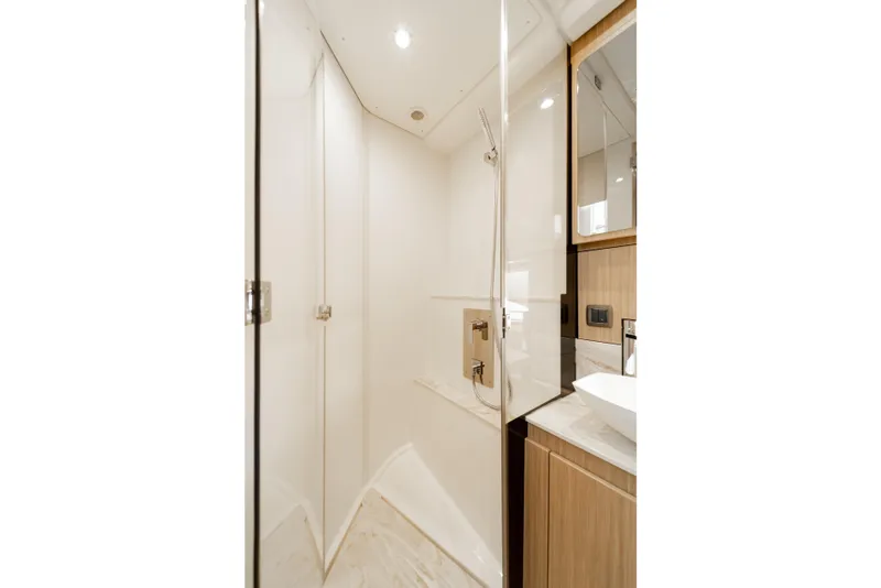 Slide: The Image of Luxurious bathroom in 2025 Prestige F4.9 yacht, featuring modern shower and elegant fixtures. - 34