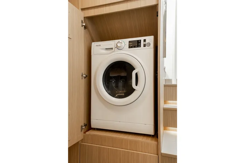 Slide: The Image of Modern Prestige F4.9 washing machine in wooden cabinet, 2025 model. - 38